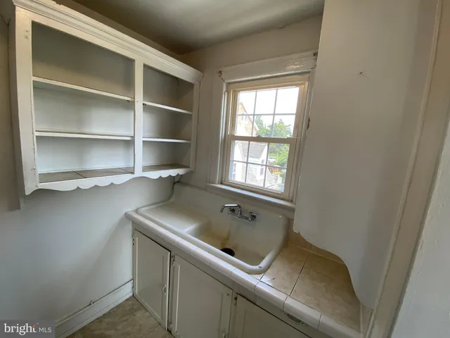 a utility room with washer and dryer