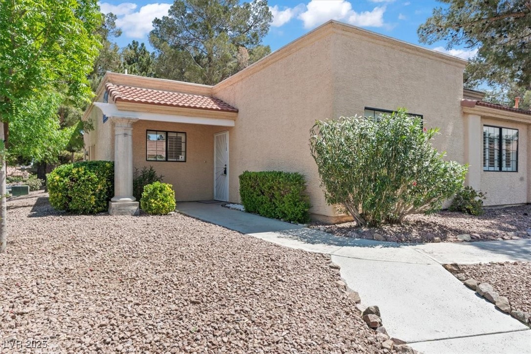 2851 South Valley View Boulevard, Unit 1172 Las Vegas, NV 89102 - Photo 1 of 57 Mediterranean / spanish home with a tiled roof and