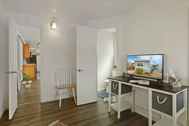 a kitchen with stainless steel appliances granite countertop a stove and a refrigerator