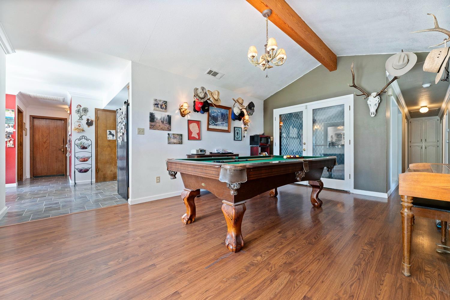 305 Monroe Street Coalinga, CA 93210 - Photo 15 of 53 a dining room with furniture and wooden floor