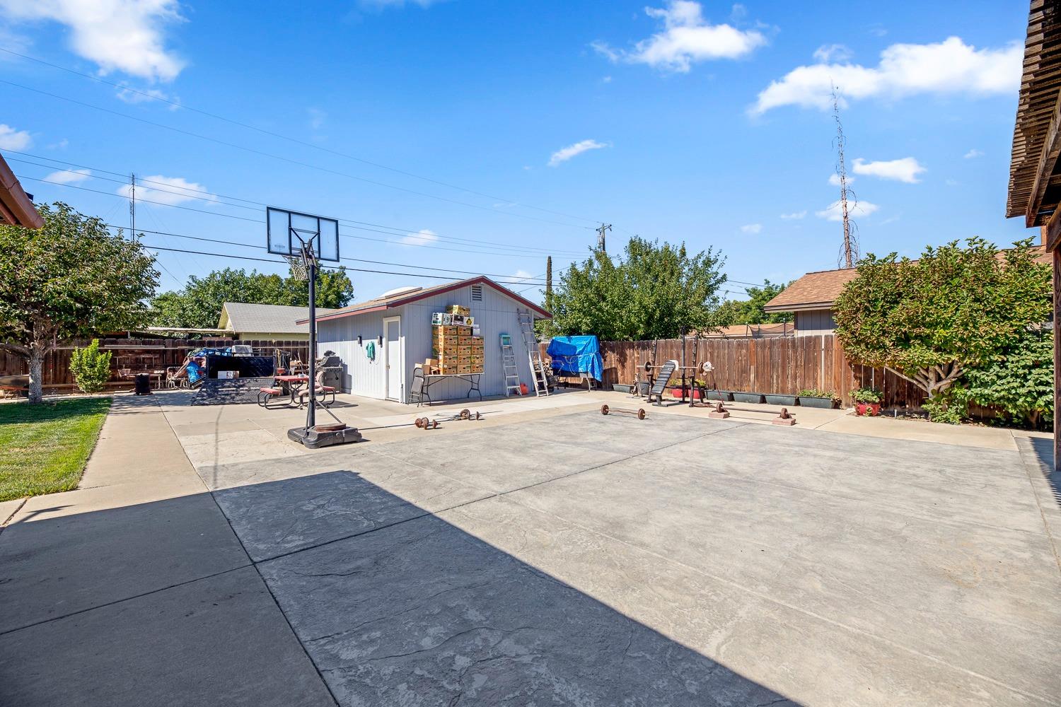 305 Monroe Street Coalinga, CA 93210 - Photo 36 of 53 a view of a house with sitting area and entertaining space