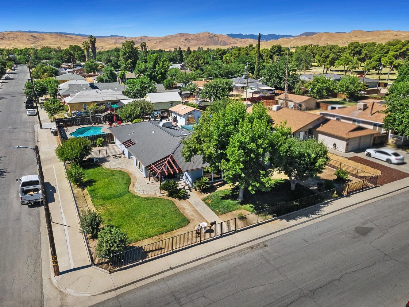 305 Monroe Street Coalinga, CA 93210 - Photo 46 of 53 an aerial view of residential houses with outdoor space and street view