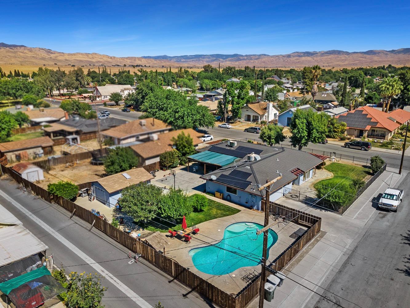 305 Monroe Street Coalinga, CA 93210 - Photo 47 of 53 an aerial view of residential houses and outdoor space