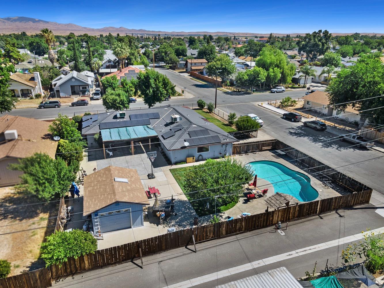 305 Monroe Street Coalinga, CA 93210 - Photo 48 of 53 an aerial view of a house with a garden