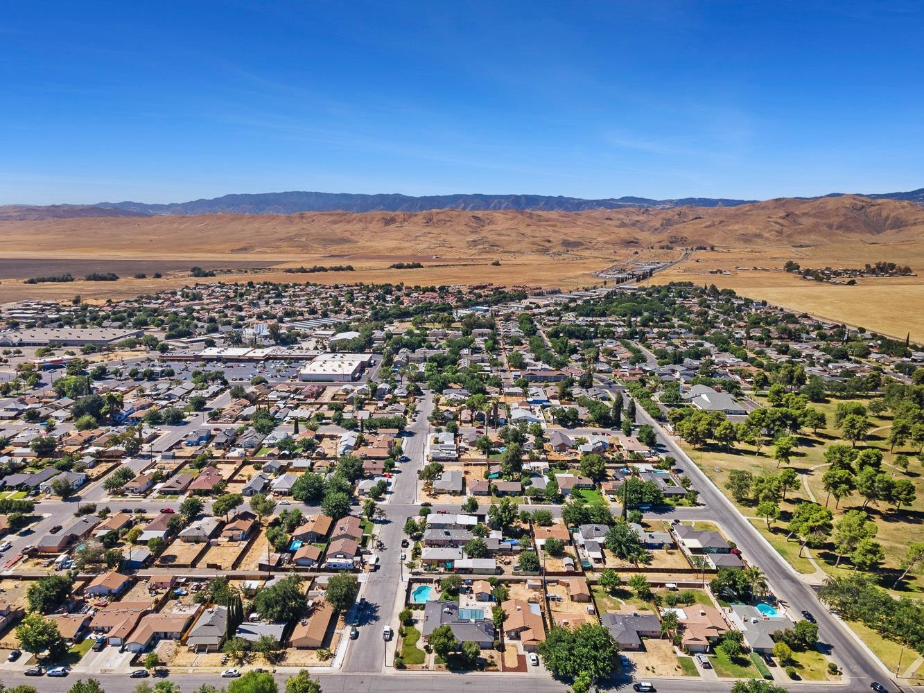 305 Monroe Street Coalinga, CA 93210 - Photo 51 of 53 an aerial view of residential building and ocean