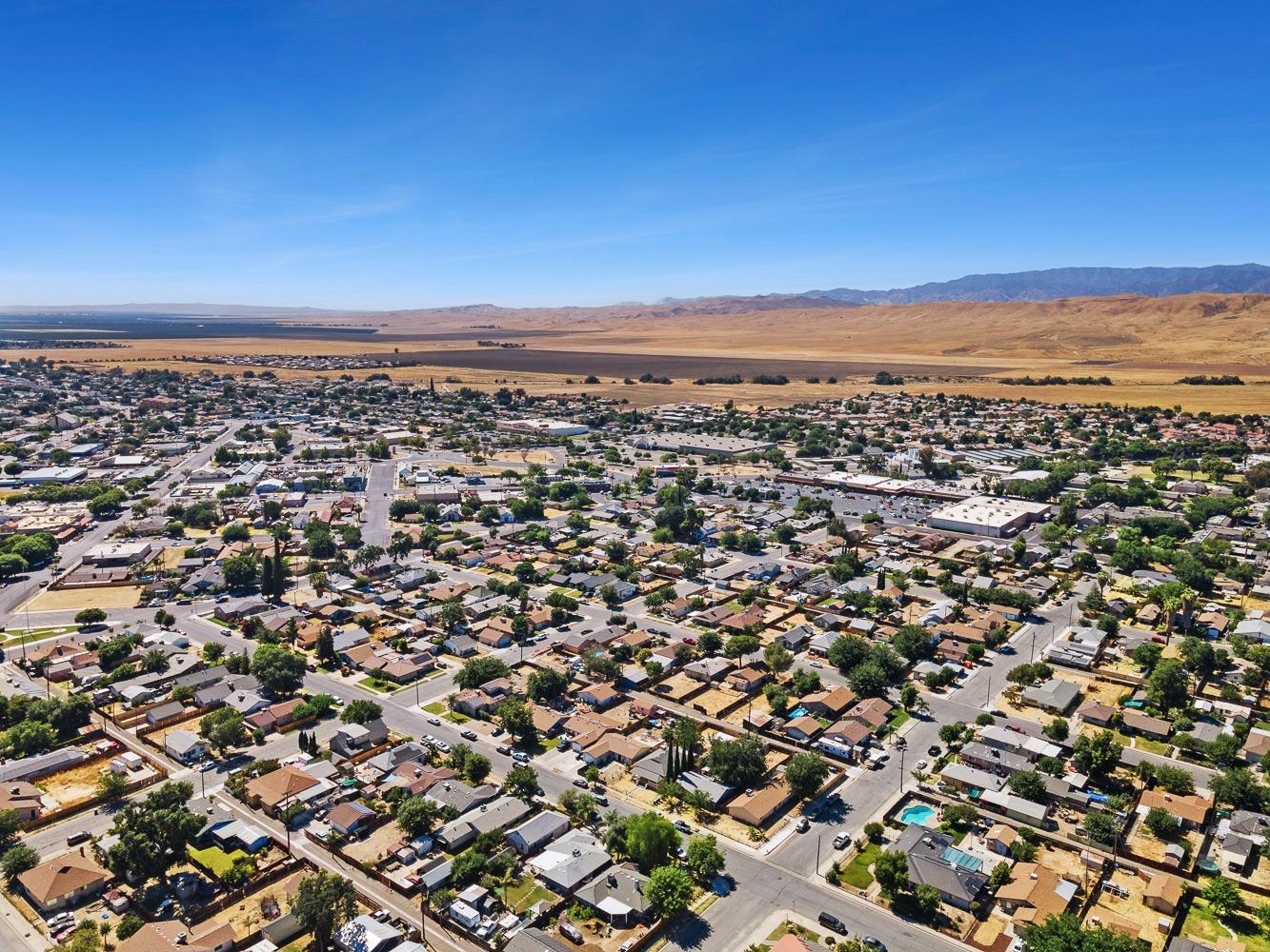 305 Monroe Street Coalinga, CA 93210 - Photo 52 of 53 an aerial view of multiple house