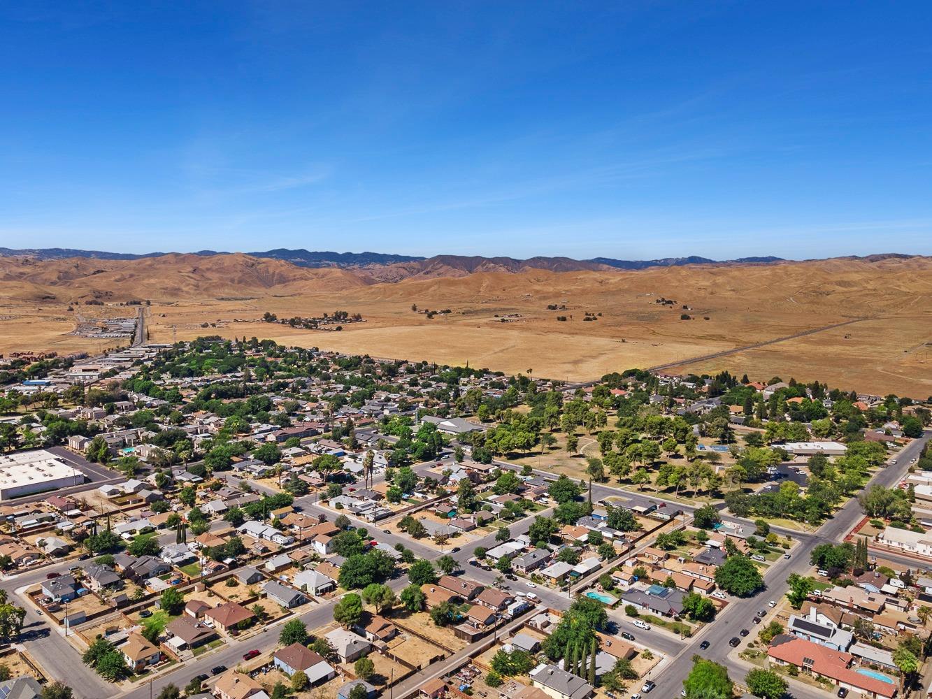 305 Monroe Street Coalinga, CA 93210 - Photo 53 of 53 an aerial view of residential houses with city view