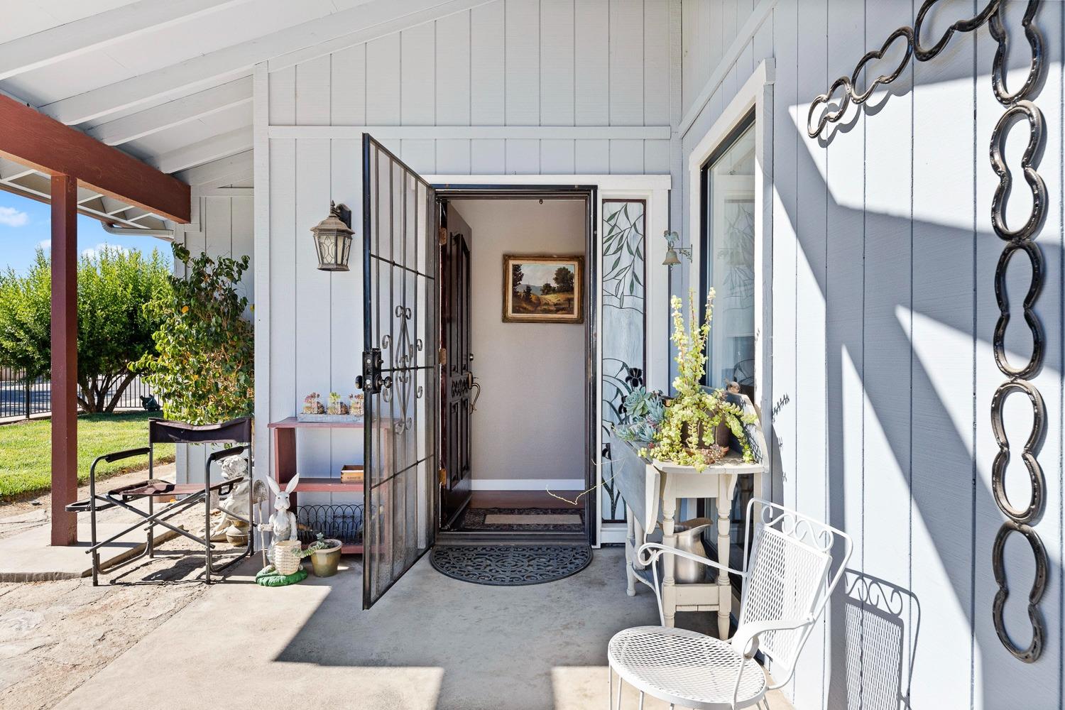 305 Monroe Street Coalinga, CA 93210 - Photo 7 of 53 a living room with patio furniture