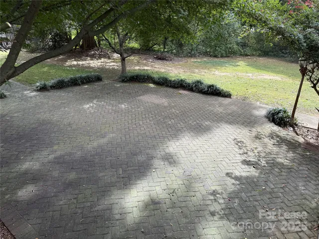 a view of a road with a yard