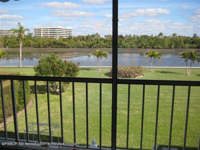2175 Ibis Isle Road, Unit 4 Palm Beach, FL 33480 - Photo 1 of 9 a view of lake from balcony