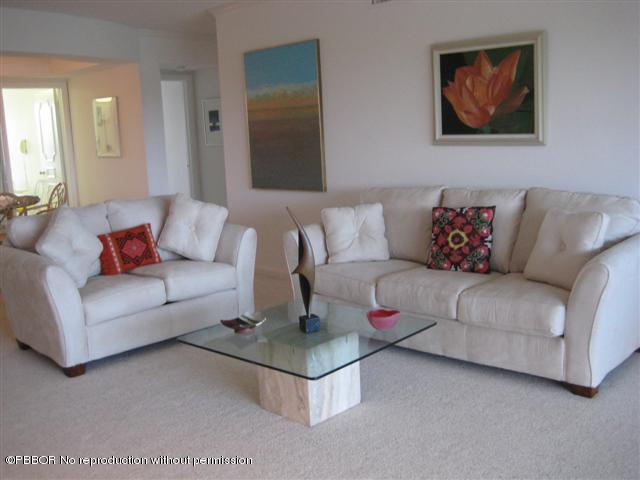 2175 Ibis Isle Road, Unit 4 Palm Beach, FL 33480 - Photo 3 of 9 a living room with furniture and a couch