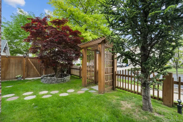 a view of a backyard with a small cabin