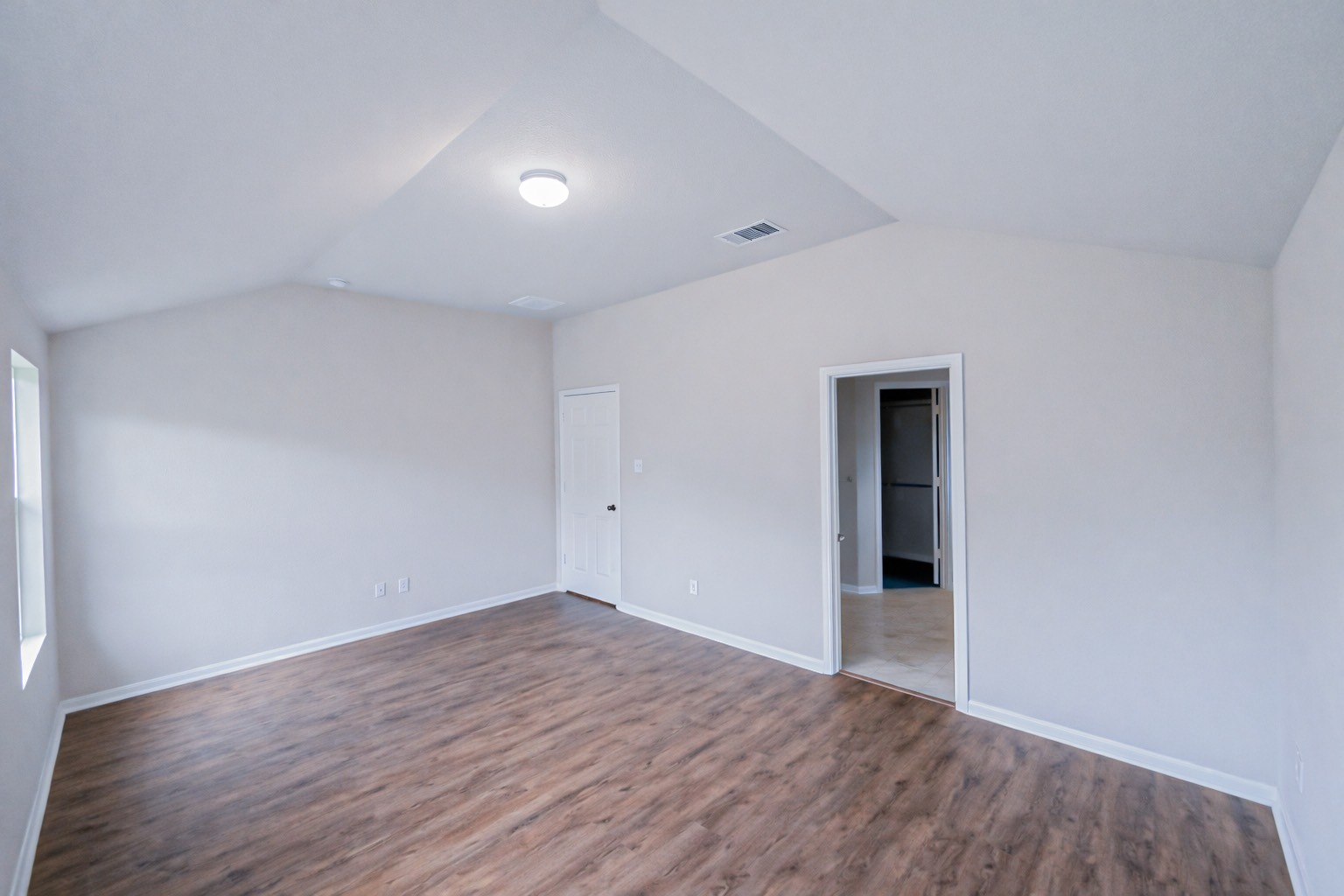 3323 Winchester Rnch Trail Katy, TX 77493 - Photo 12 of 22 Spacious and versatile primary bedroom eoffering a clean, open layout and modern finishes!