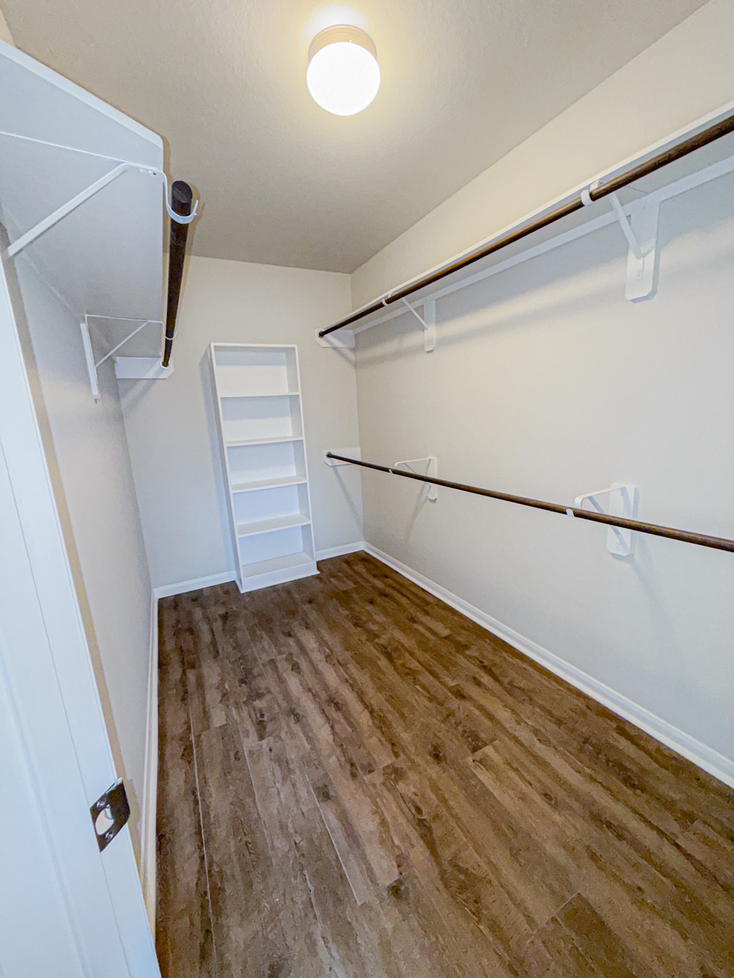 3323 Winchester Rnch Trail Katy, TX 77493 - Photo 16 of 22 Spacious and well-designed walk-in closet offering exceptional storage and organization!