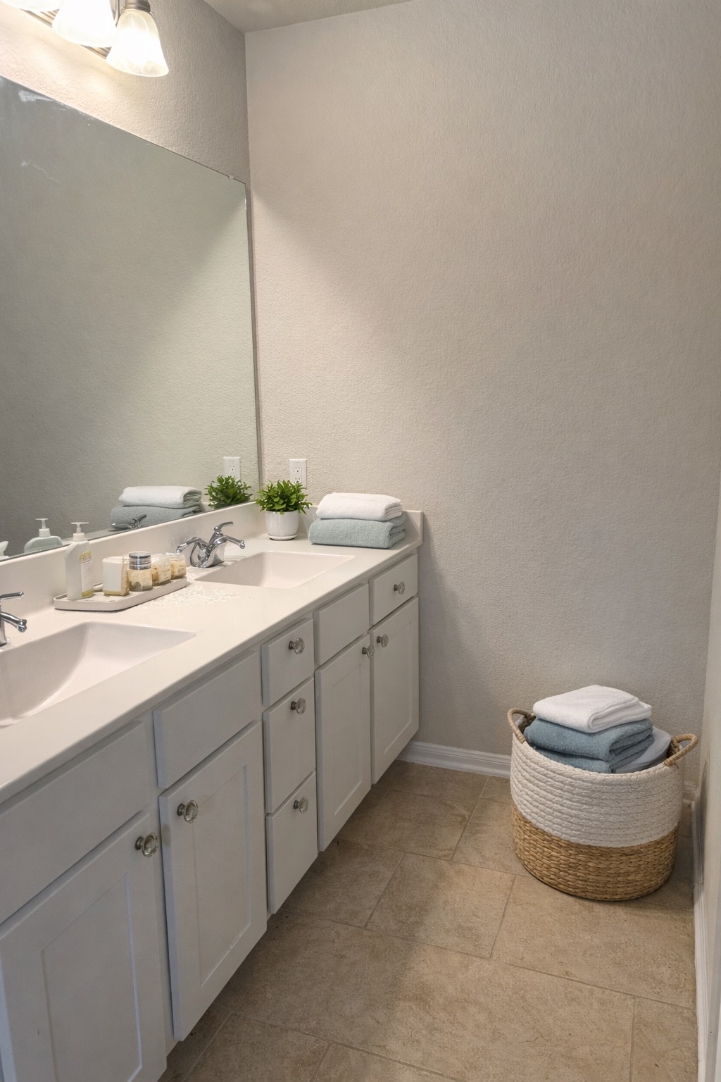 3323 Winchester Rnch Trail Katy, TX 77493 - Photo 10 of 22 Bright and functional bathroom vanity area designed with both style and convenience in mind! This space features a spacious double-sink vanity with ample cabinet storage, perfect for everyday use