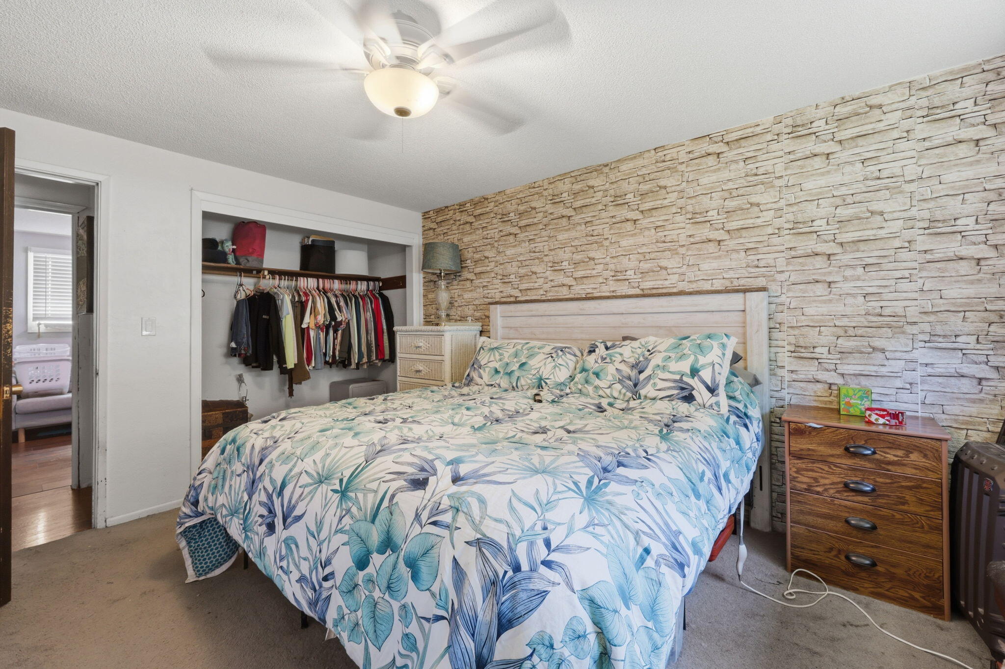 102 Elm Street Phoenix, OR 97535 - Photo 20 of 28 a bedroom with a bed and a walk in closet