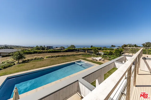a view of a terrace with chairs