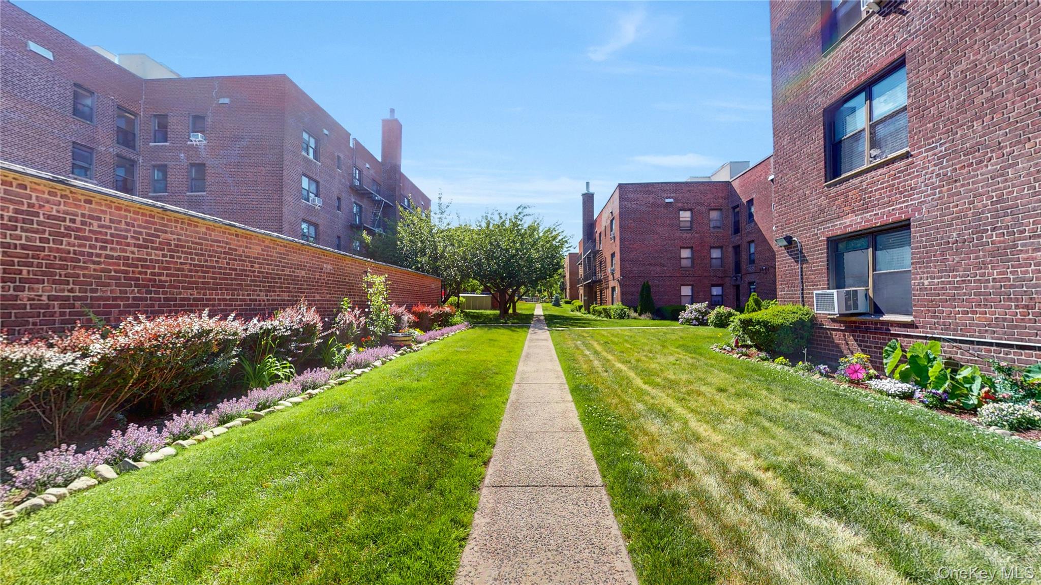 52-21 39th Road, Unit 2A Queens, NY 11377 - Photo 2 of 21 interior courtyard
