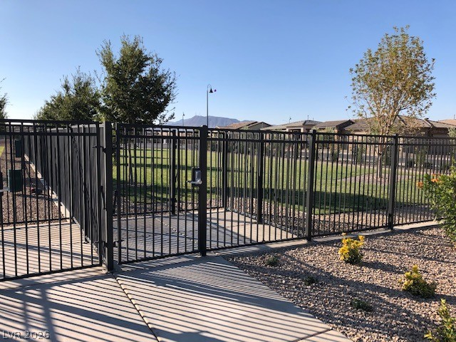 498 Pebble Run Avenue Henderson, NV 89011 - Photo 47 of 47 Secure community dog park with ample green space provides a perfect play area for pets.