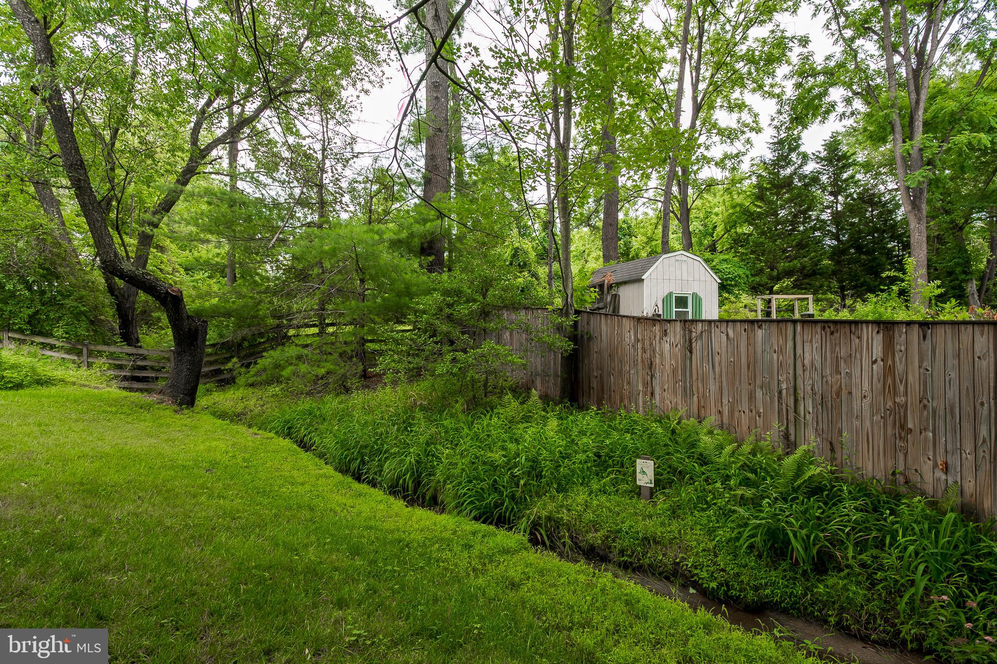 9890 Postwick Road Ellicott City, MD 21042 - Photo 38 of 41 Stream in Back Yard