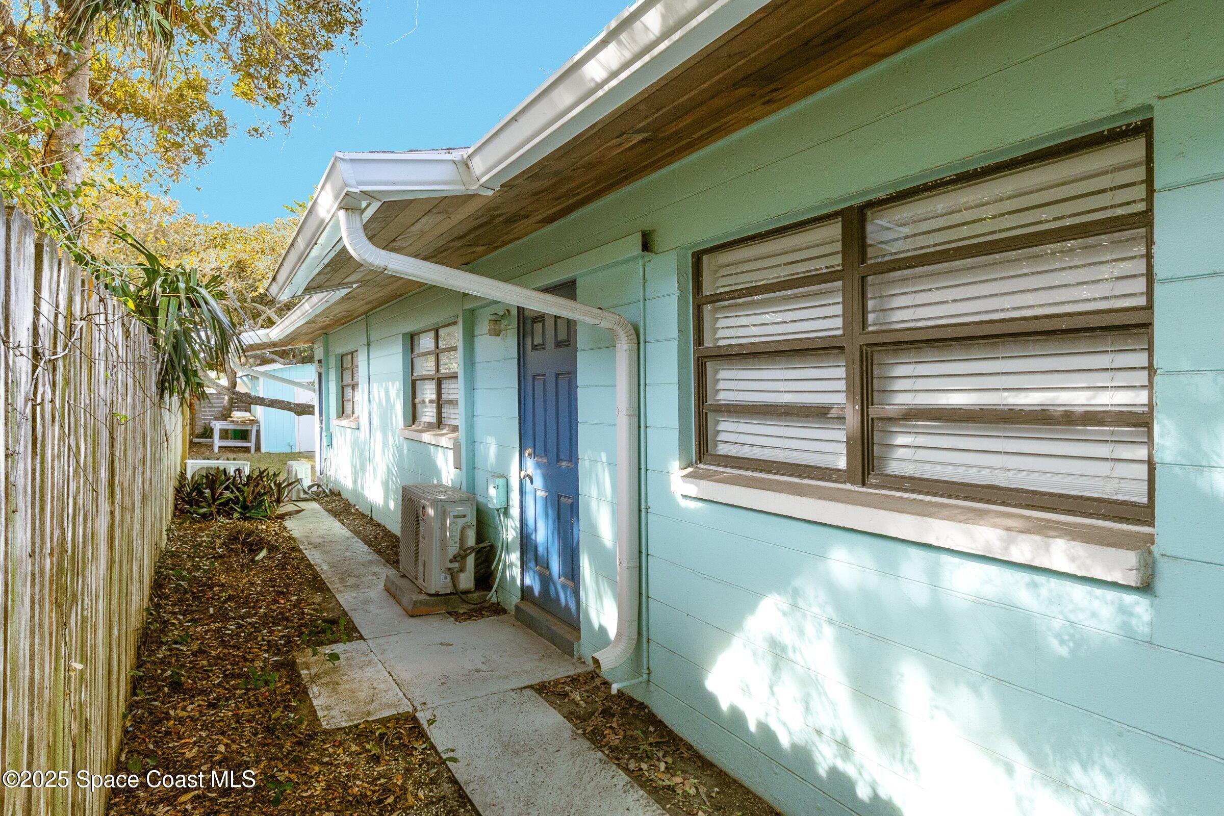 300 South Orlando Avenue, Unit 4 5 6 Cocoa Beach, FL 32931 - Photo 49 of 56 a view of a house with a door