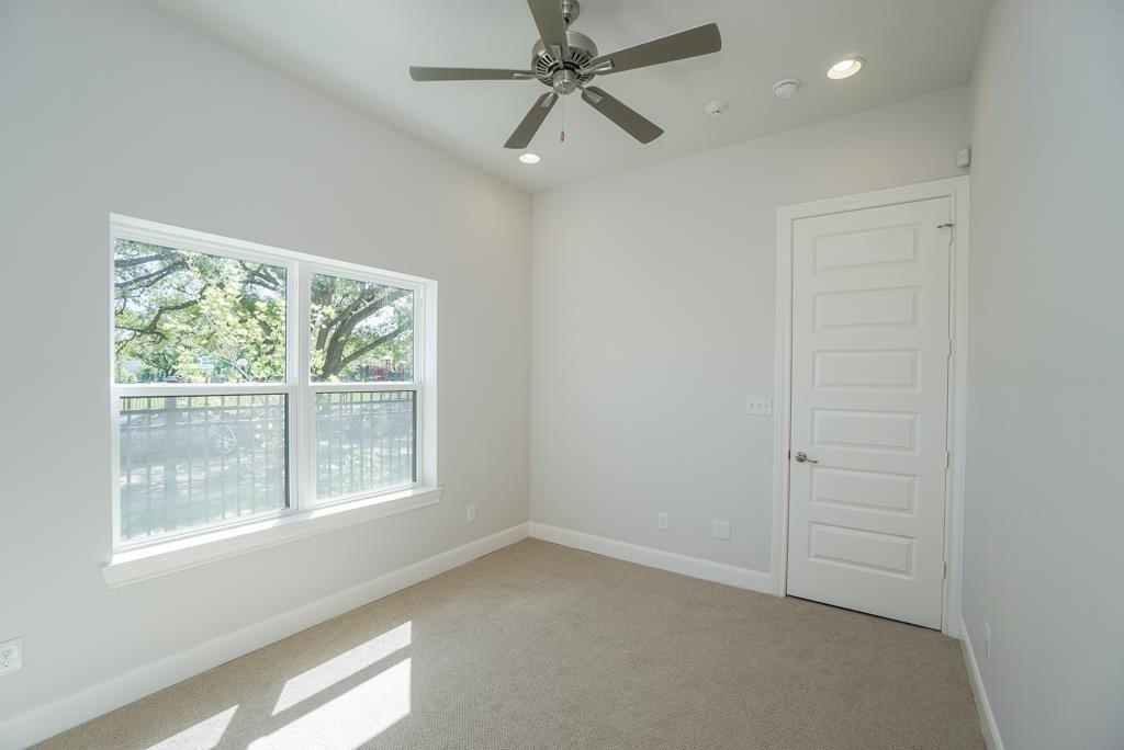 3351 Kilgore Street Houston, TX 77021 - Photo 16 of 25 an empty room with a window and a fan