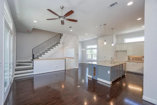 a view of kitchen and windows with electric appliances