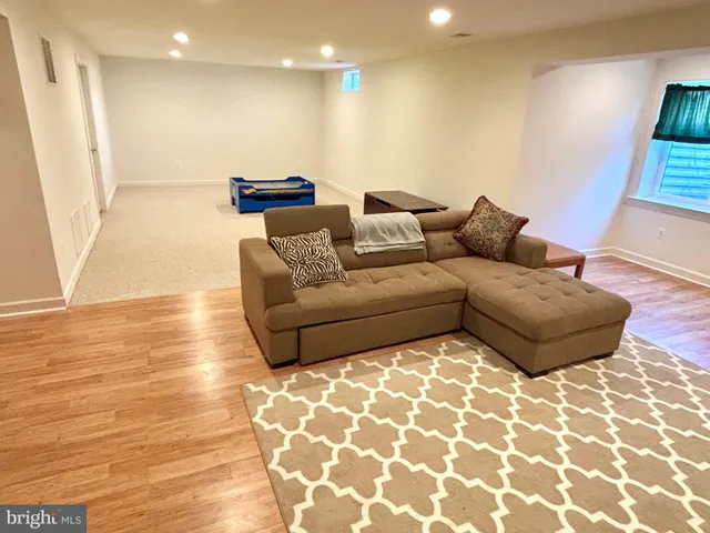 a bathroom with a sink a mirror and a bathtub