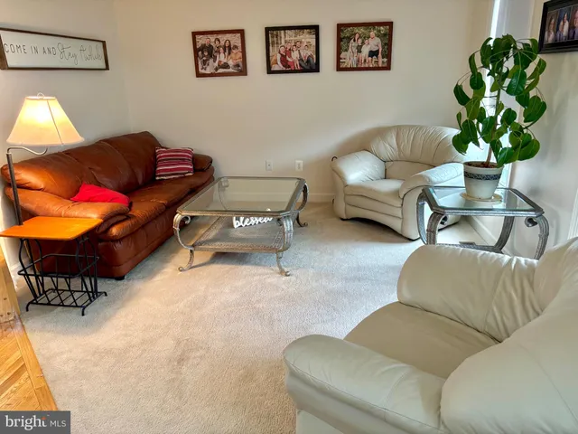 a living room with furniture and a couch
