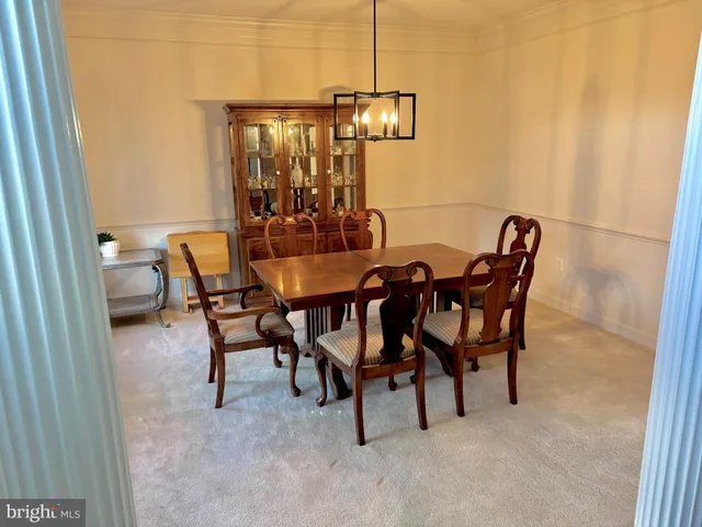 a view of a dining room and livingroom furniture