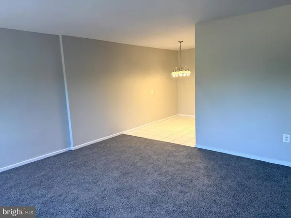an empty room with a natural light
