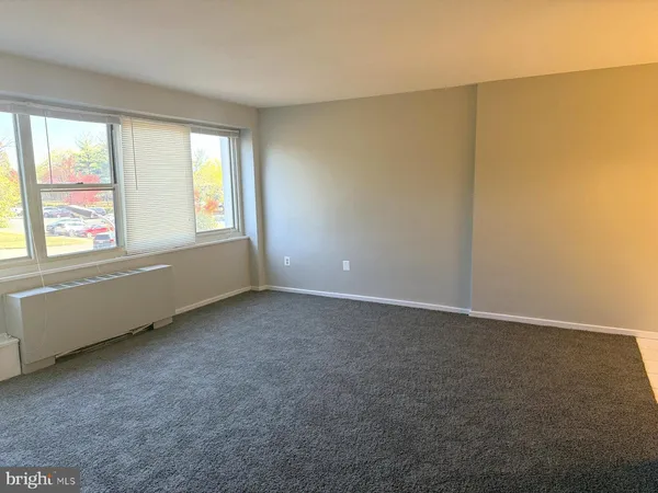 an empty room with a window