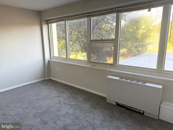 an empty room with a window