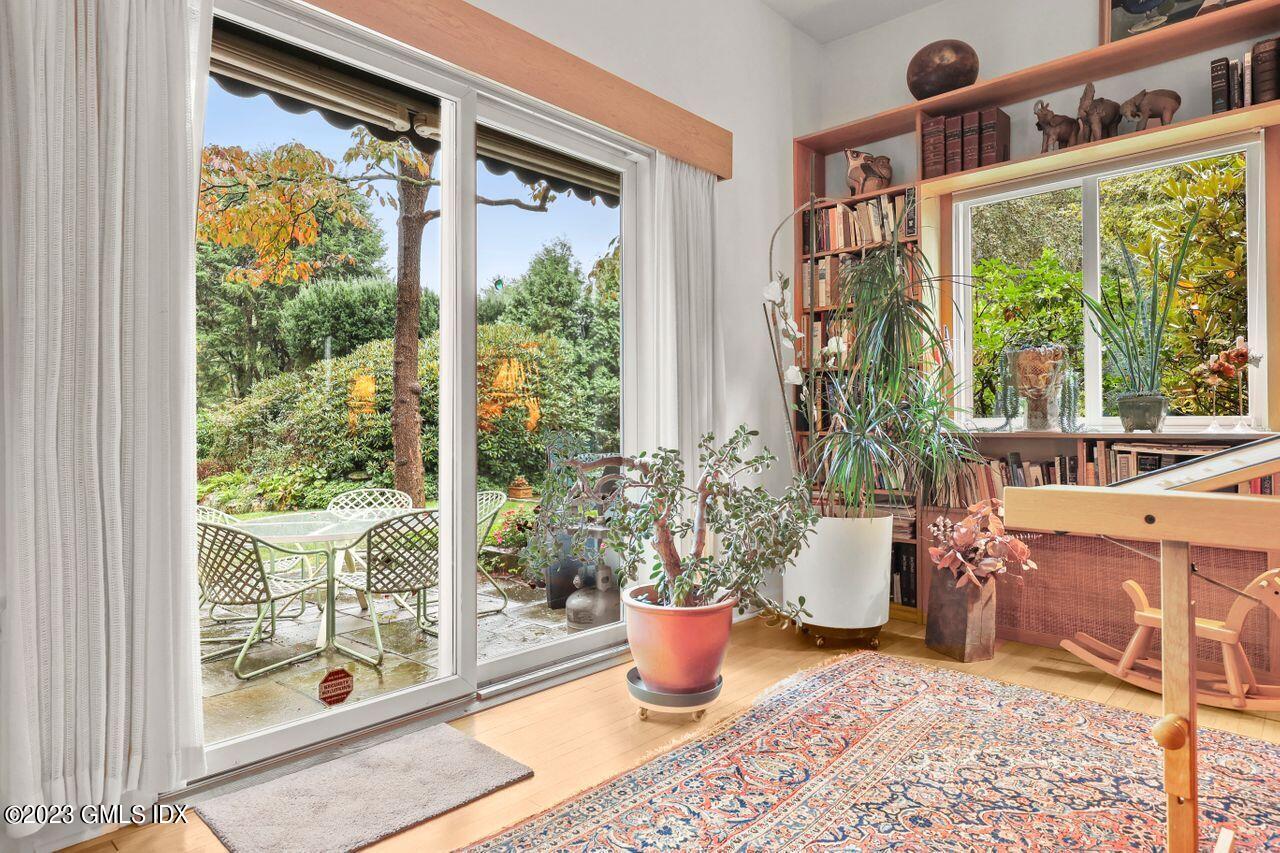 236 Riverside Avenue Riverside, CT 06878 - Photo 11 of 40 a living room filled with furniture and a potted plant