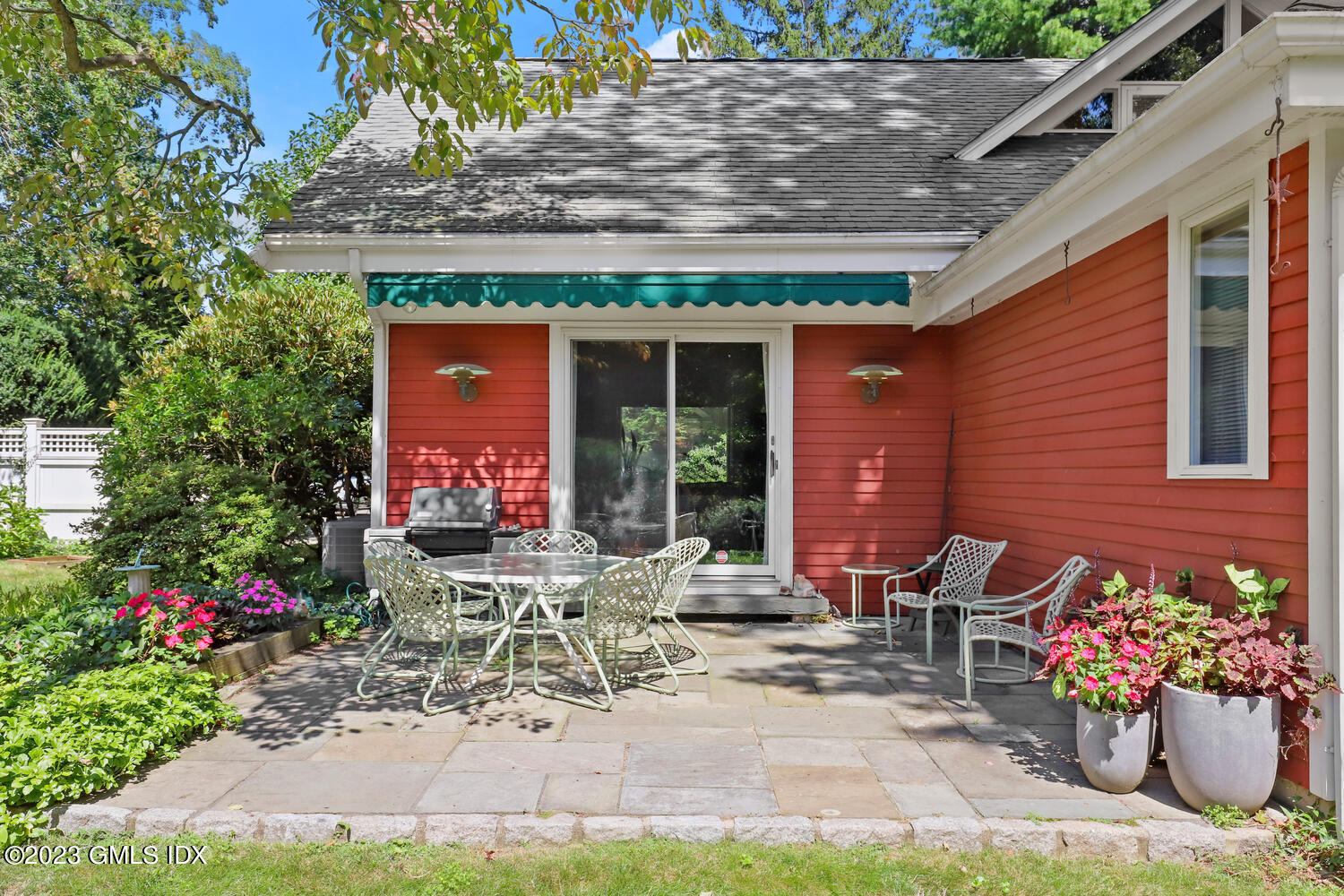 236 Riverside Avenue Riverside, CT 06878 - Photo 30 of 40 a view of a chairs and table in the patio with a fountain