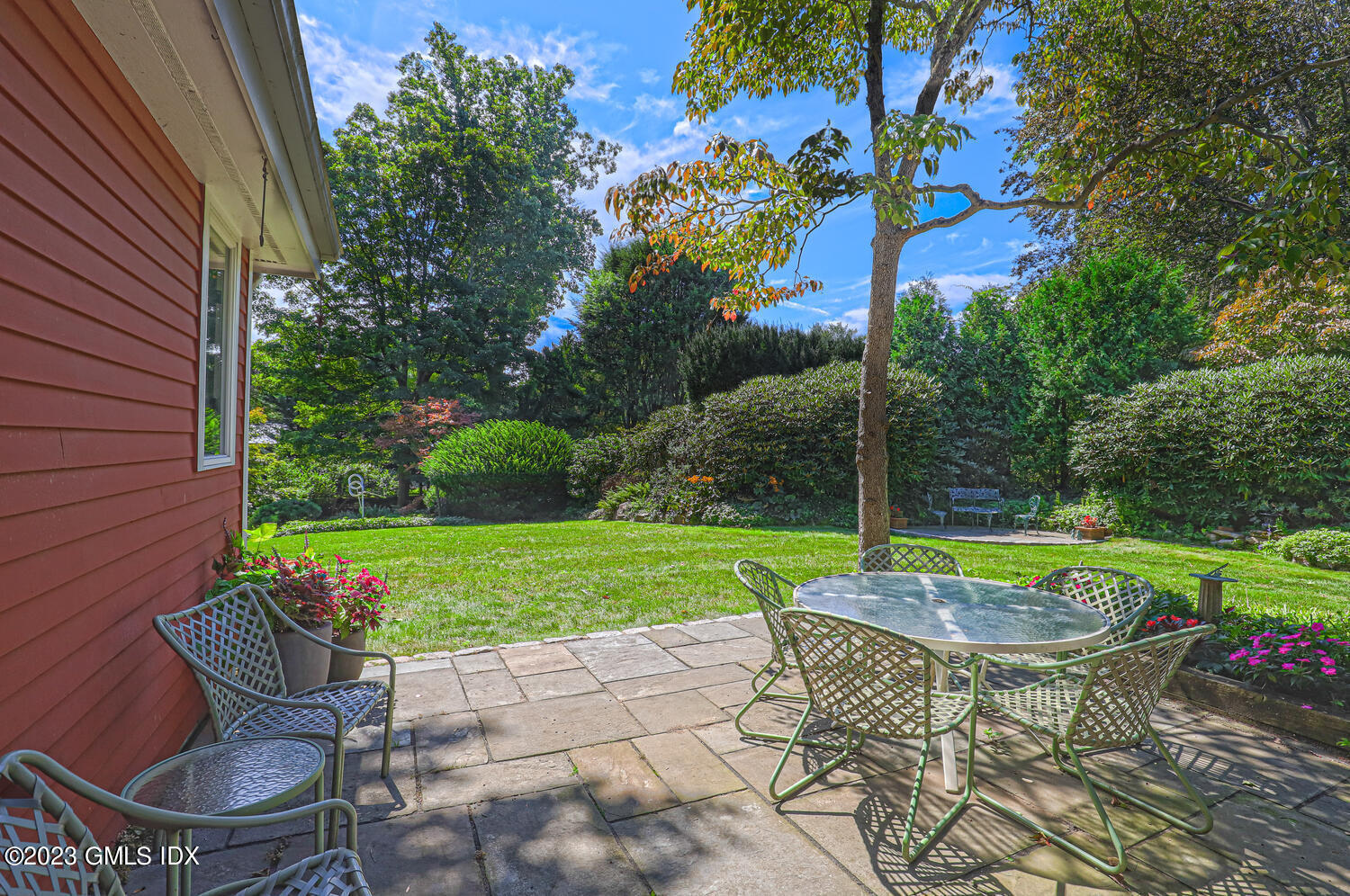 236 Riverside Avenue Riverside, CT 06878 - Photo 31 of 40 a view of backyard with swimming pool and outdoor seating