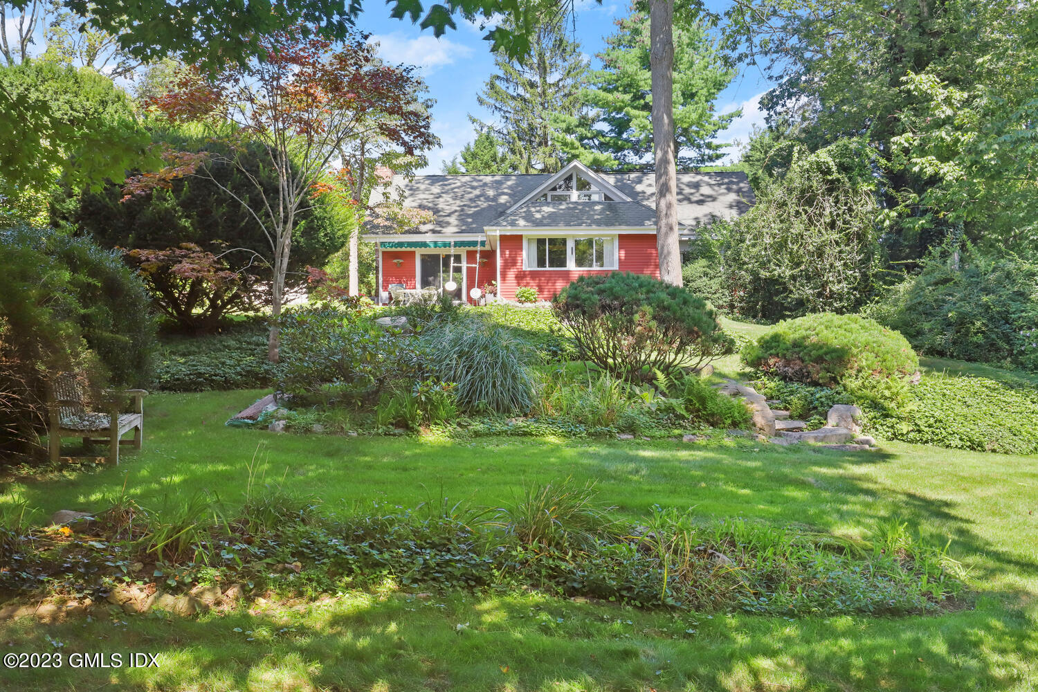 236 Riverside Avenue Riverside, CT 06878 - Photo 36 of 40 a front view of a house with a yard