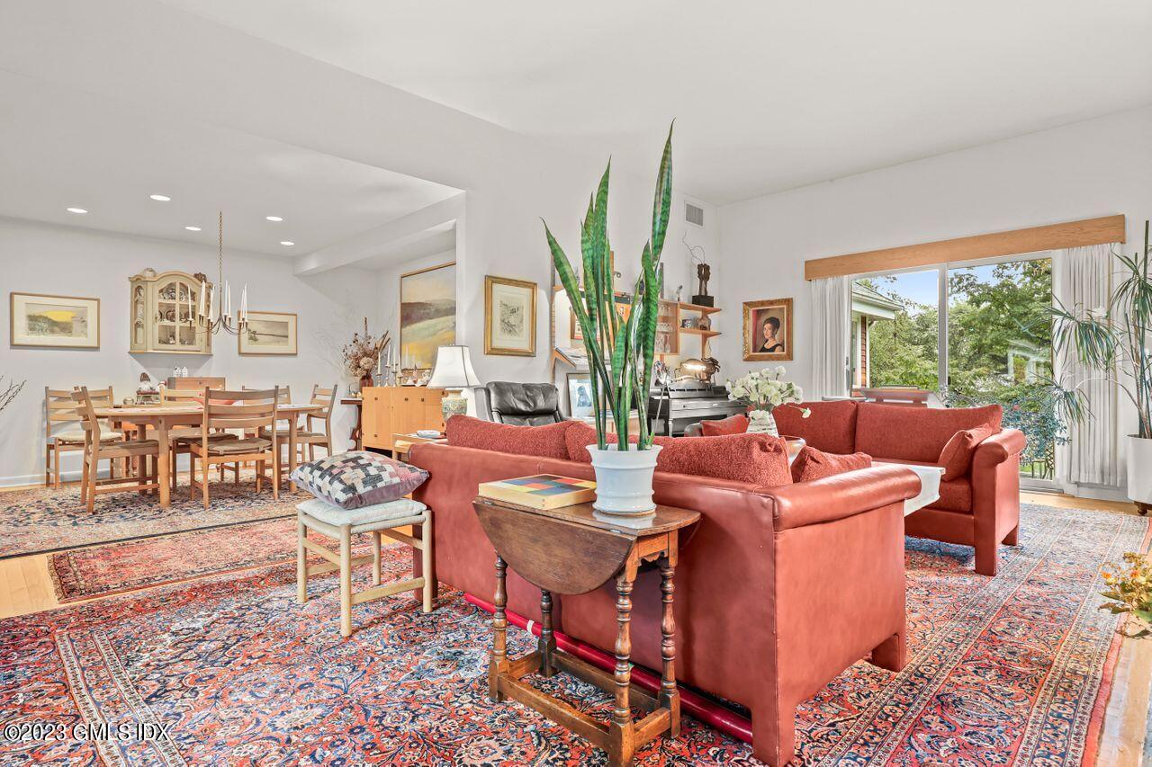 236 Riverside Avenue Riverside, CT 06878 - Photo 7 of 40 a living room with furniture a large window and a table