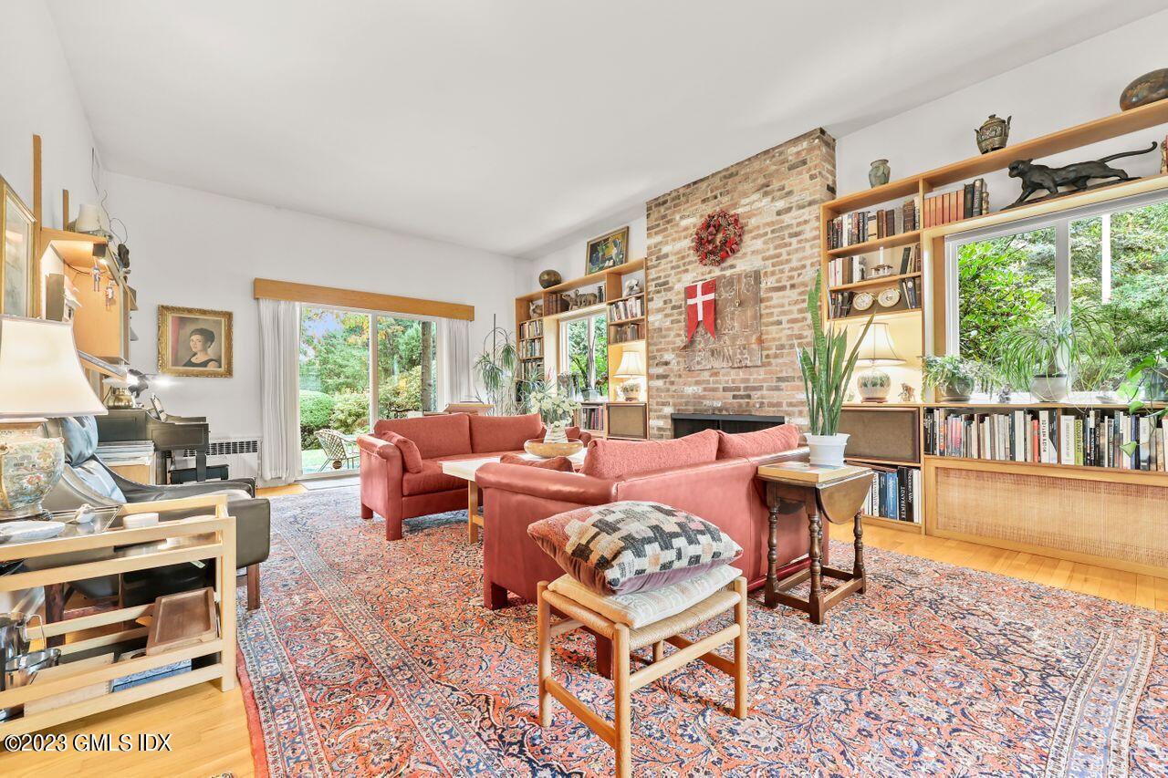 236 Riverside Avenue Riverside, CT 06878 - Photo 8 of 40 a living room with furniture and a table