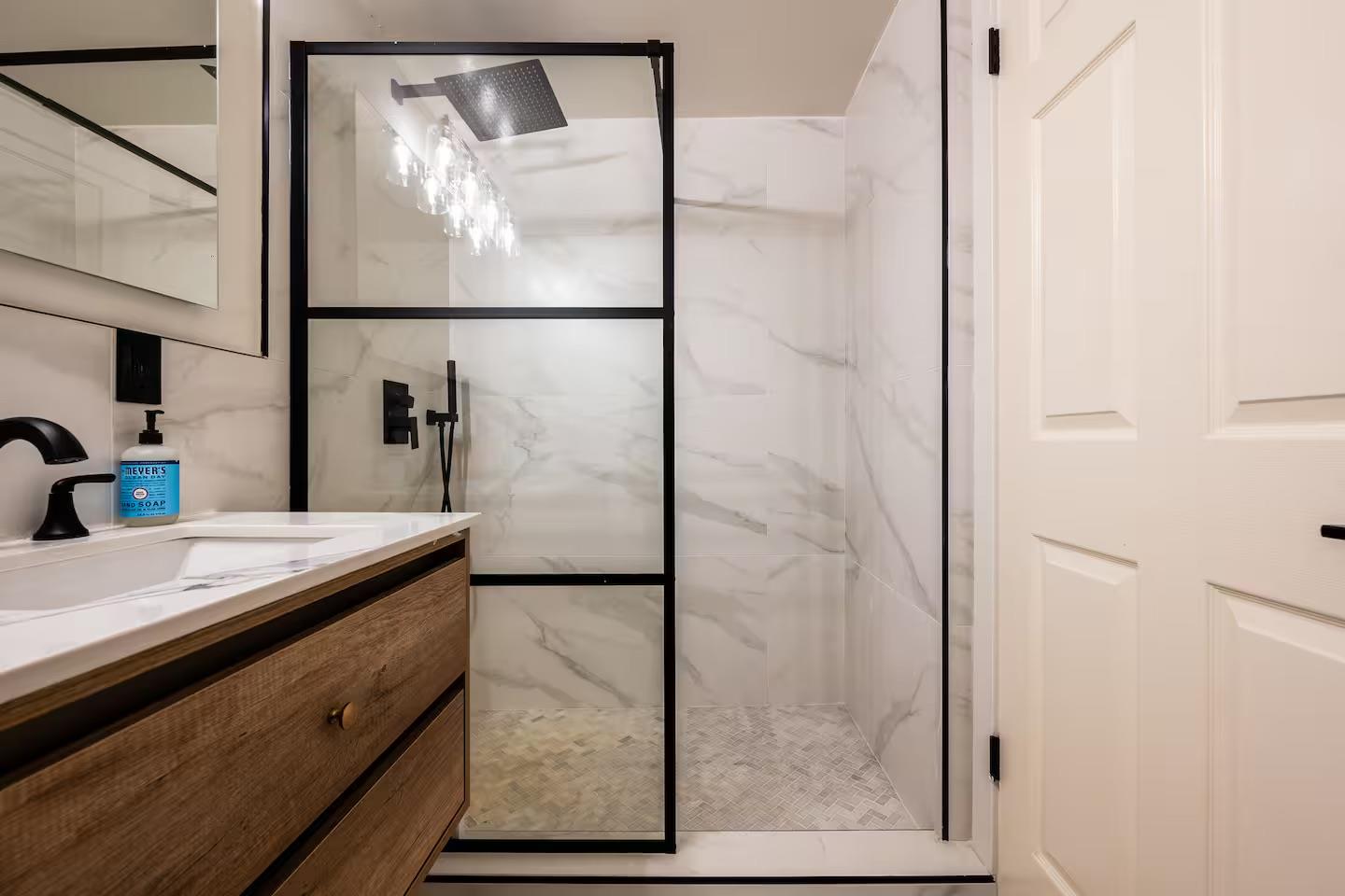 1003 Laurel Glen Road Soquel, CA 95073 - Photo 52 of 101 a bathroom with a mirror and a shower