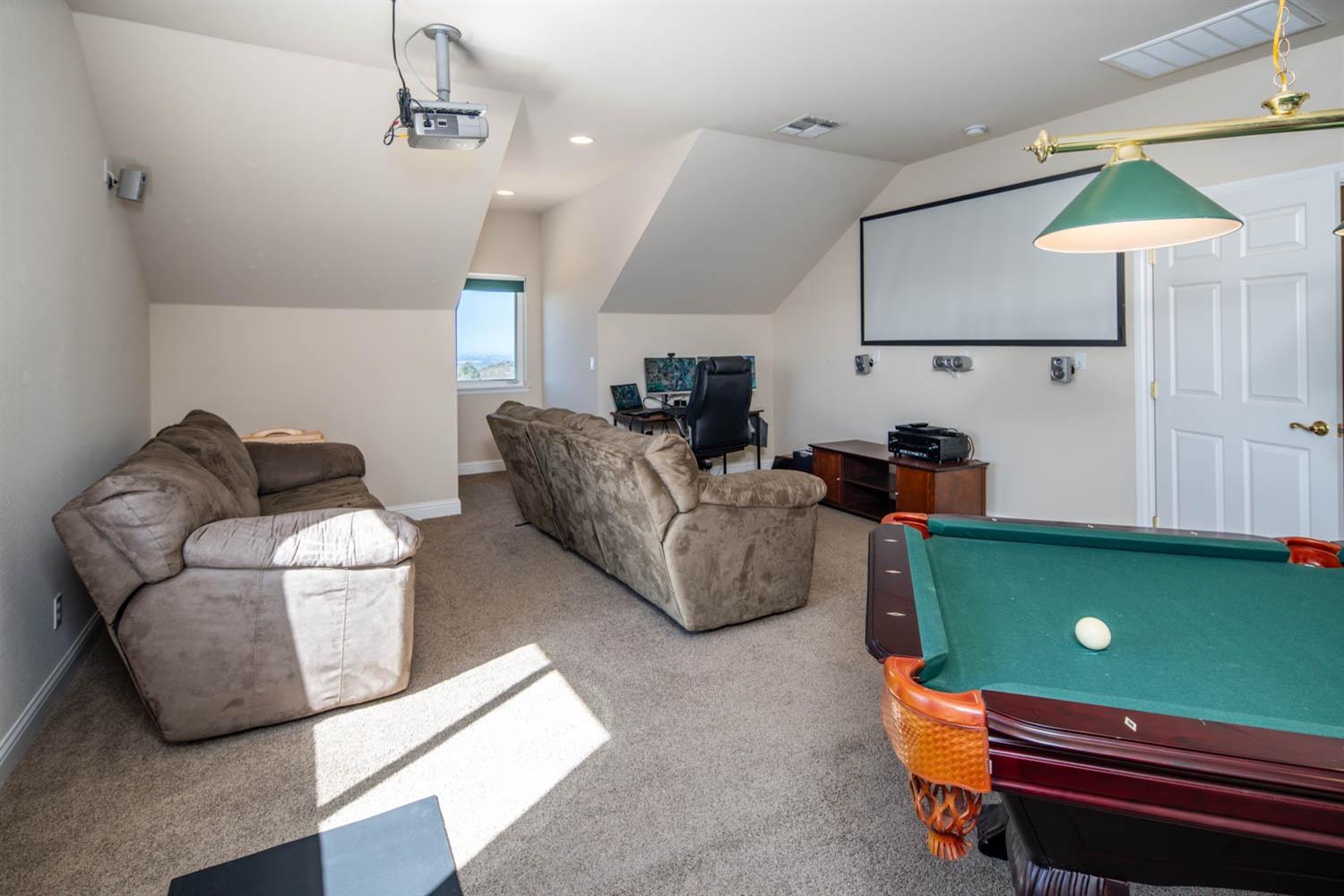 2661 Mountain Oak Lane Rescue, CA 95672 - Photo 40 of 87 Movie viewing area with built in projector and screen