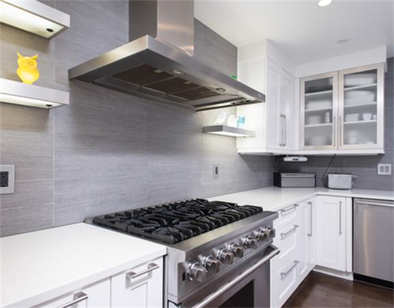 26 Whitney Road Newton, MA 02460 - Photo 12 of 29 a kitchen with a stove and a sink