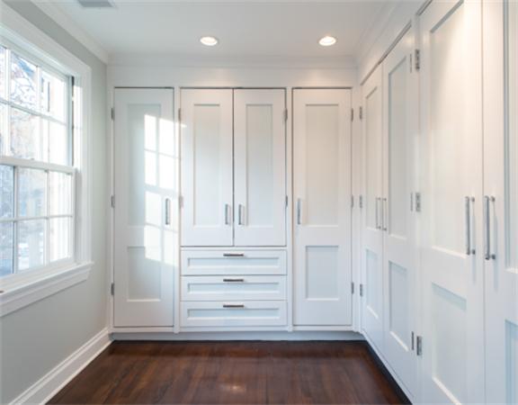 26 Whitney Road Newton, MA 02460 - Photo 14 of 29 a view of walk in closet with empty racks