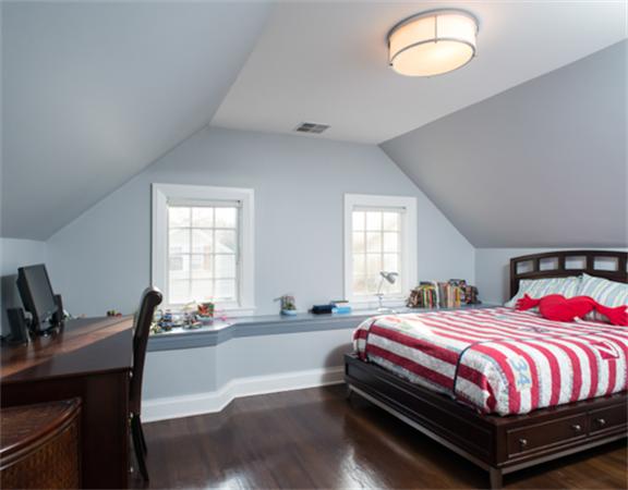 26 Whitney Road Newton, MA 02460 - Photo 21 of 29 a bedroom with a bed and window