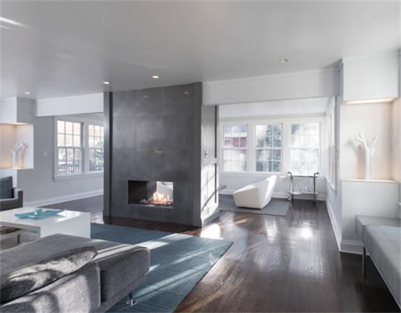 26 Whitney Road Newton, MA 02460 - Photo 4 of 29 a living room with furniture and a fireplace