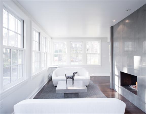 26 Whitney Road Newton, MA 02460 - Photo 6 of 29 a living room with furniture and a flat screen tv