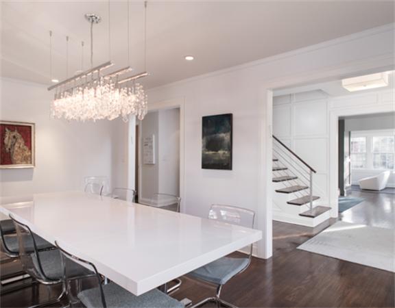 26 Whitney Road Newton, MA 02460 - Photo 7 of 29 a view of a dining room with furniture and wooden floor