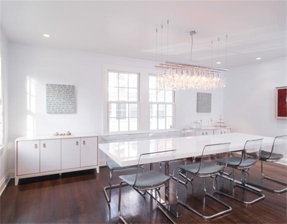 26 Whitney Road Newton, MA 02460 - Photo 8 of 29 a large kitchen with kitchen island a sink table and chairs