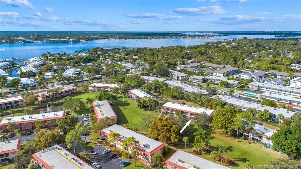 1909 Southwest Palm City Road, Unit B Stuart, FL 34994 - Photo 2 of 36 a view of a city with an ocean