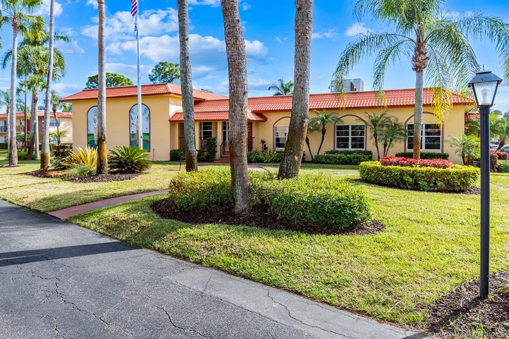 1909 Southwest Palm City Road, Unit B Stuart, FL 34994 - Photo 30 of 36 a view of a park with potted plants